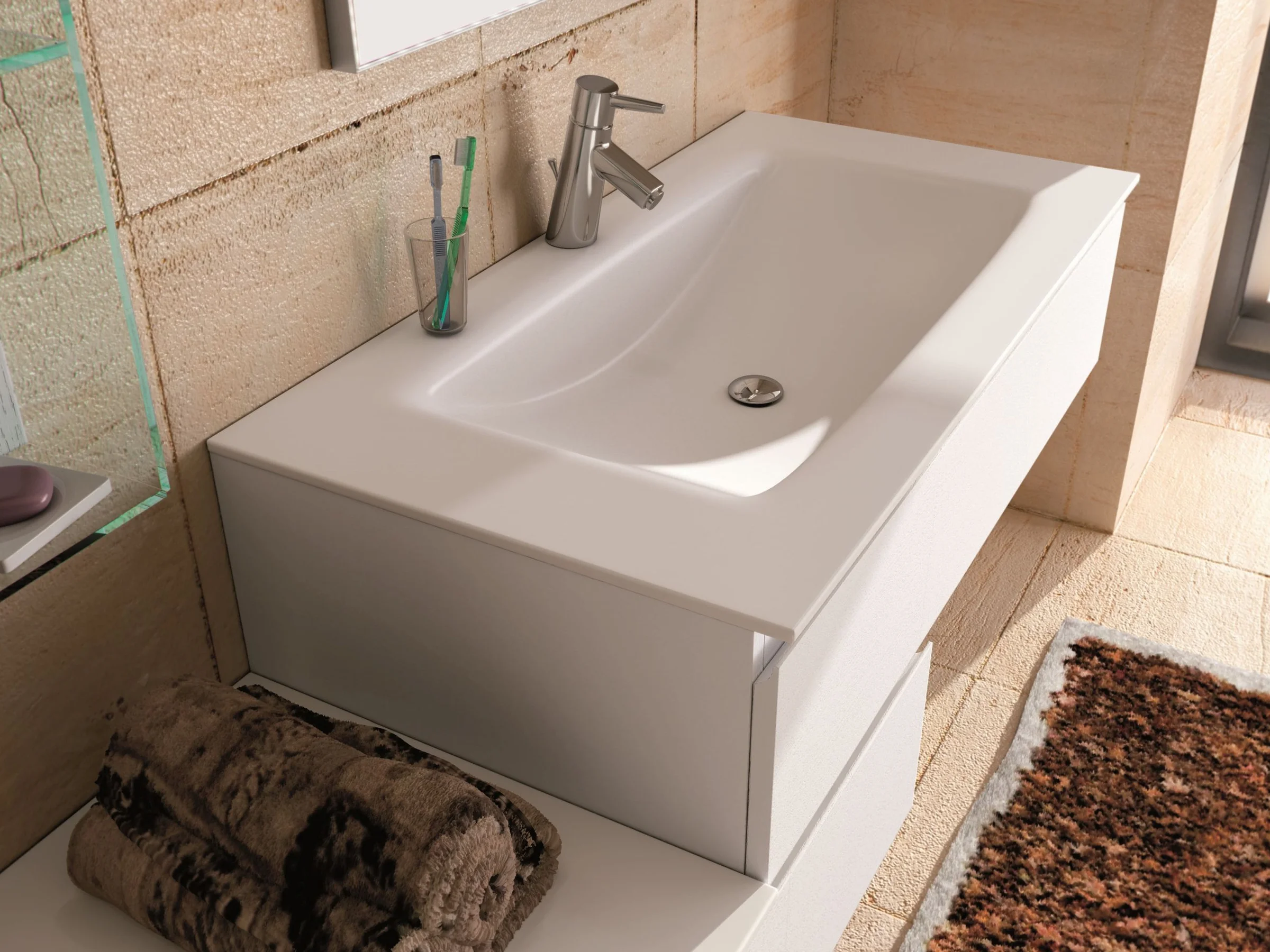 Waschtisch YOUNG Y-402 mit weißer Corian-Platte und flacher Beckenmulde auf minimalistischem Unterschrank