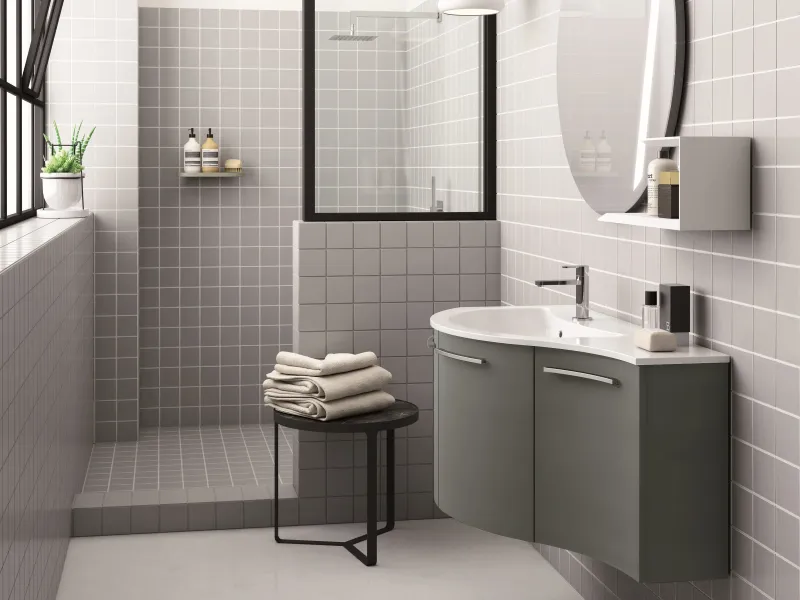 Waschtisch OLA P-503/B mit konvex gewölbten Fronten in Mausgrau und organisch geschwungenem weißen Becken