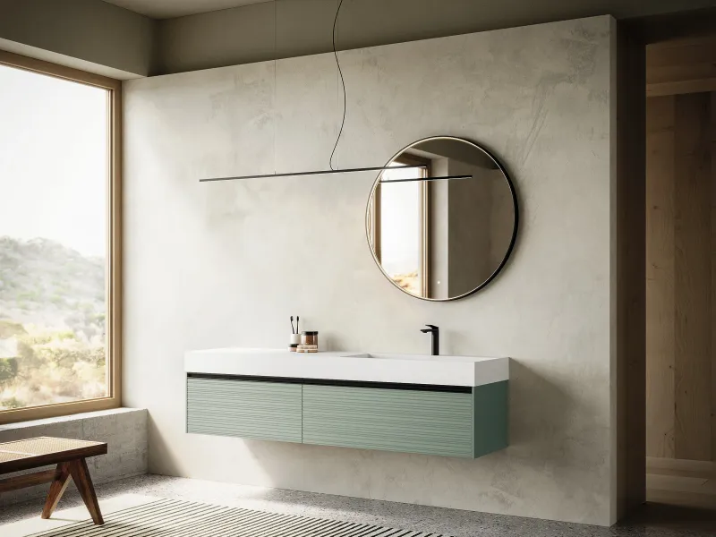 Waschtisch REVERSO 04 mit weißer Ocritech-Platte und gerillten Fronten in gedämpftem Graugrün