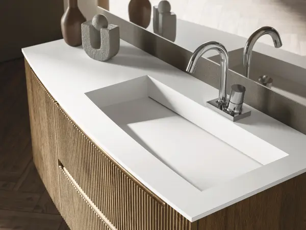 Waschtisch VERTIGO EVO 02 mit weißer Ocritech-Platte und konvex gewölbten Fronten in dunklem Holzdekor