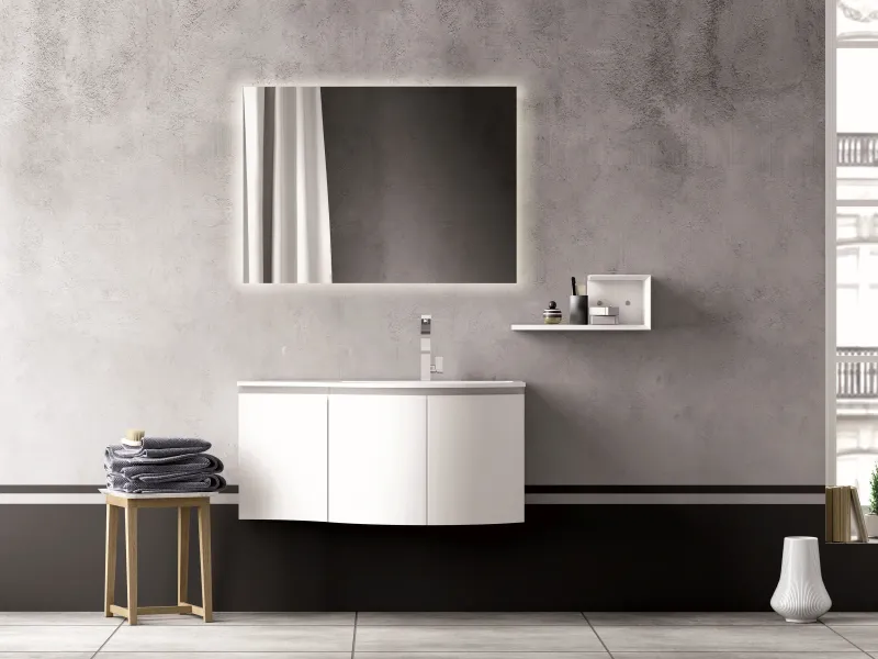 Waschtisch YOUNG F-511/B mit konvex gewölbten weißen Fronten und organisch geschwungenem Becken