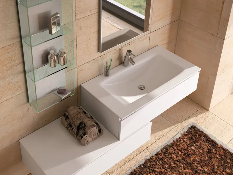 Waschtisch YOUNG Y-402 mit weißer Corian-Platte und flacher Beckenmulde auf minimalistischem Unterschrank