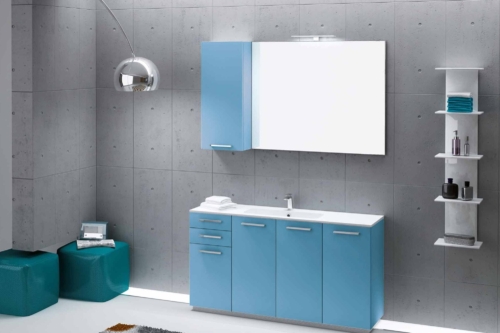 a bathroom with blue cabinets and a mirror