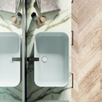 a bathroom with a mirror and sink