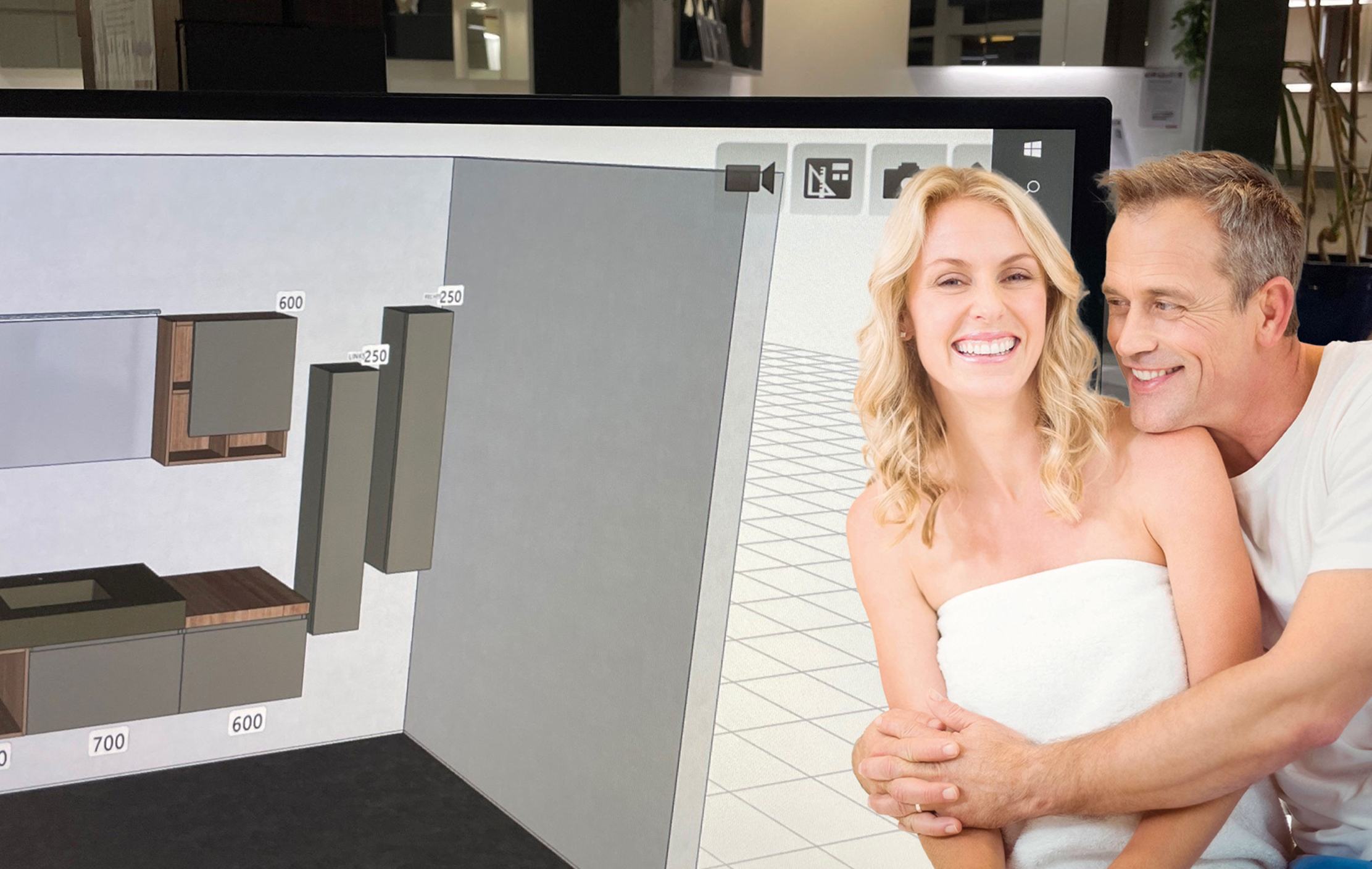 Badausstellung Ludwigsburg und Bäderstudio Stuttgart a man and woman hugging in front of a computer screen